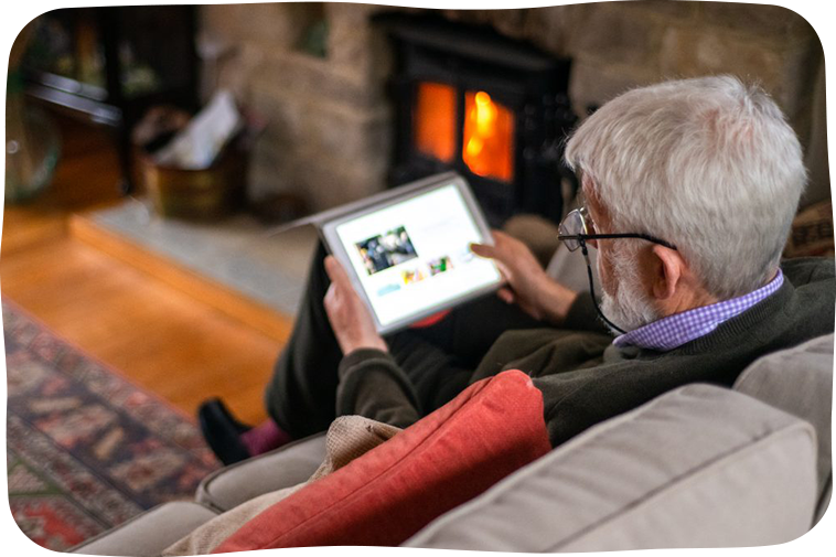 Man looking at a website on a tablet