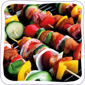 vegetable skewers on a barbeque