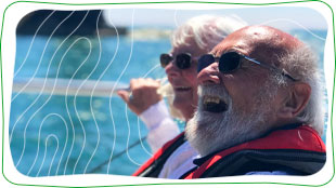 Couple laughing on boat at the Isle of Wight